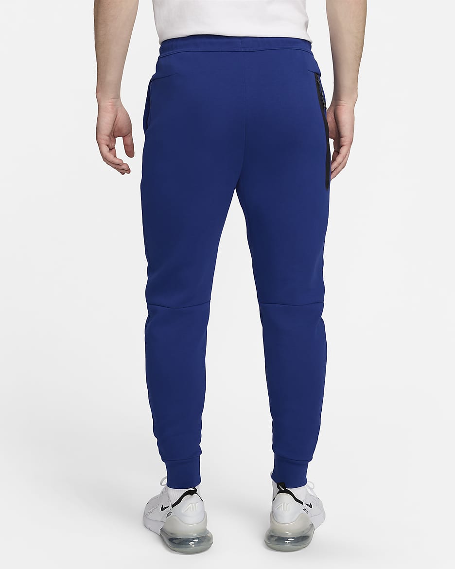 Pantaloni jogger da calcio Nike Olanda Tech Fleece – Uomo - Deep Royal Blue/Safety Orange