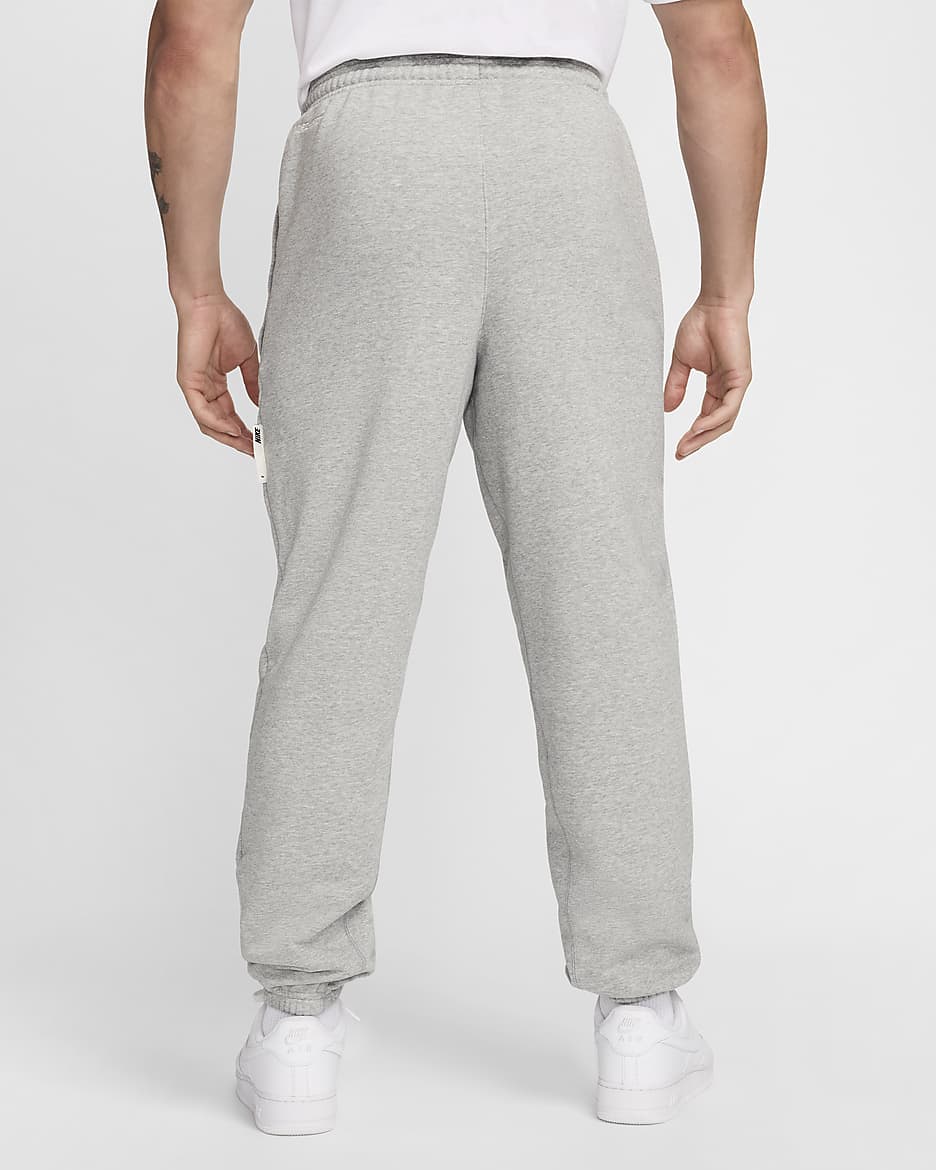 Pants de básquetbol Dri-FIT para hombre Nike Standard Issue - Gris oscuro jaspeado/Marfil pálido