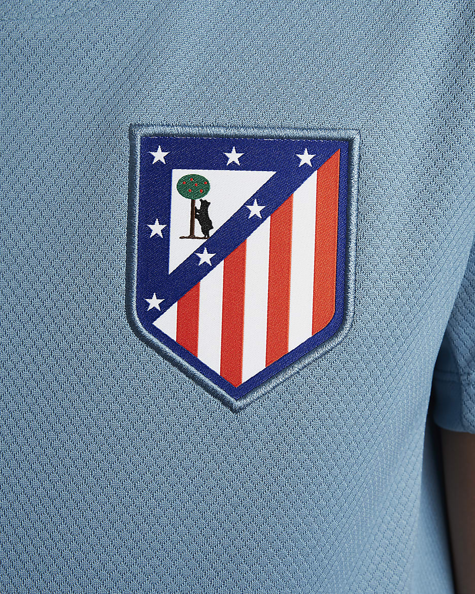 Atlético Madrid Strike Older Kids' Nike Dri-FIT Football Short-Sleeve Knit Top - Noise Aqua/Light Iron Ore/Light Crimson