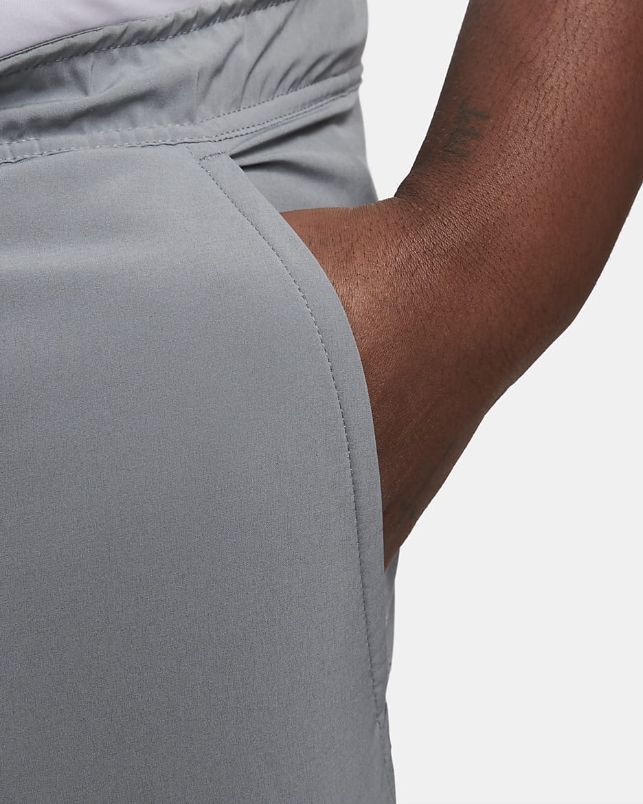 Nike Unlimited multifunctionele niet-gevoerde herenshorts met Dri-FIT (18 cm) - Smoke Grey/Zwart/Smoke Grey