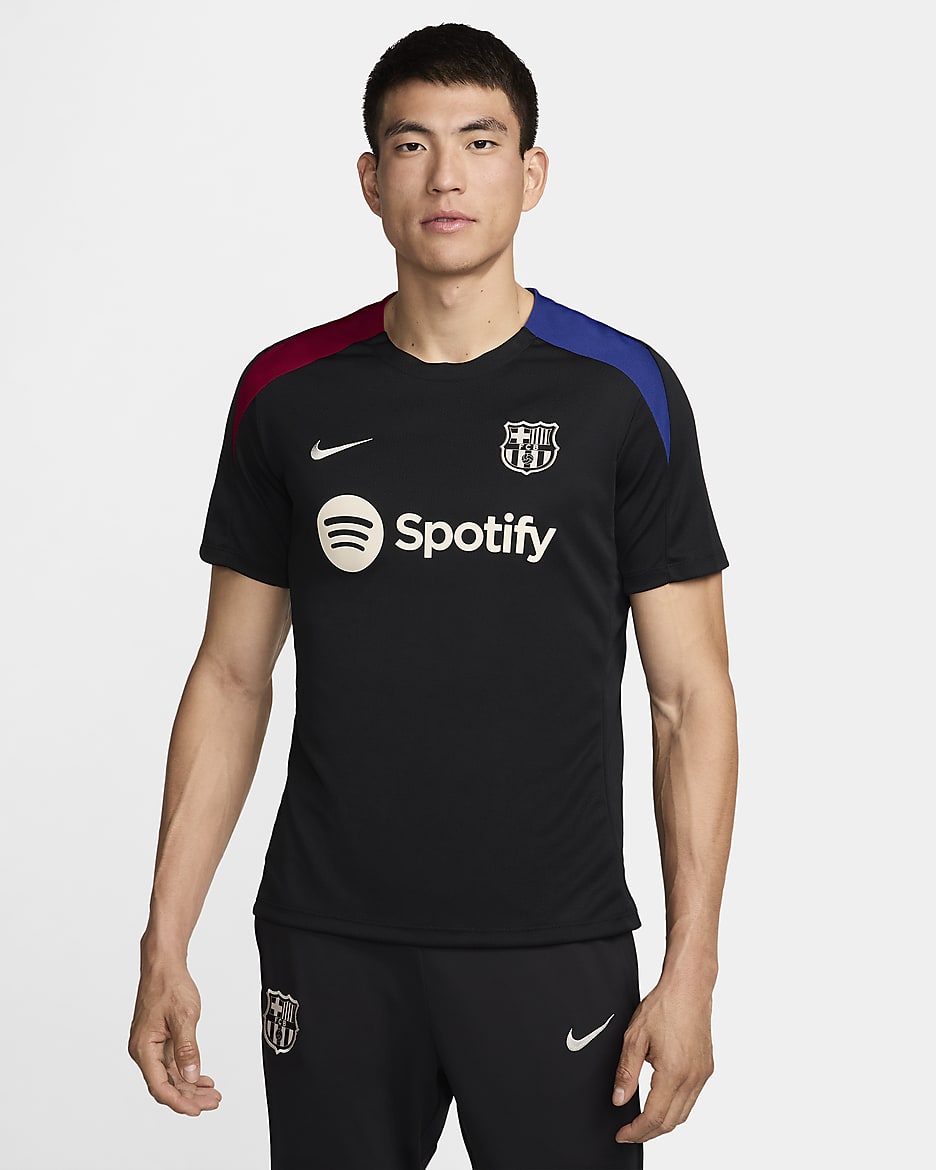 Pánské pleteninové fotbalové tričko Nike Dri-FIT FC Barcelona Strike s krátkým rukávem - Černá/Noble Red/Deep Royal Blue/Light Orewood Brown