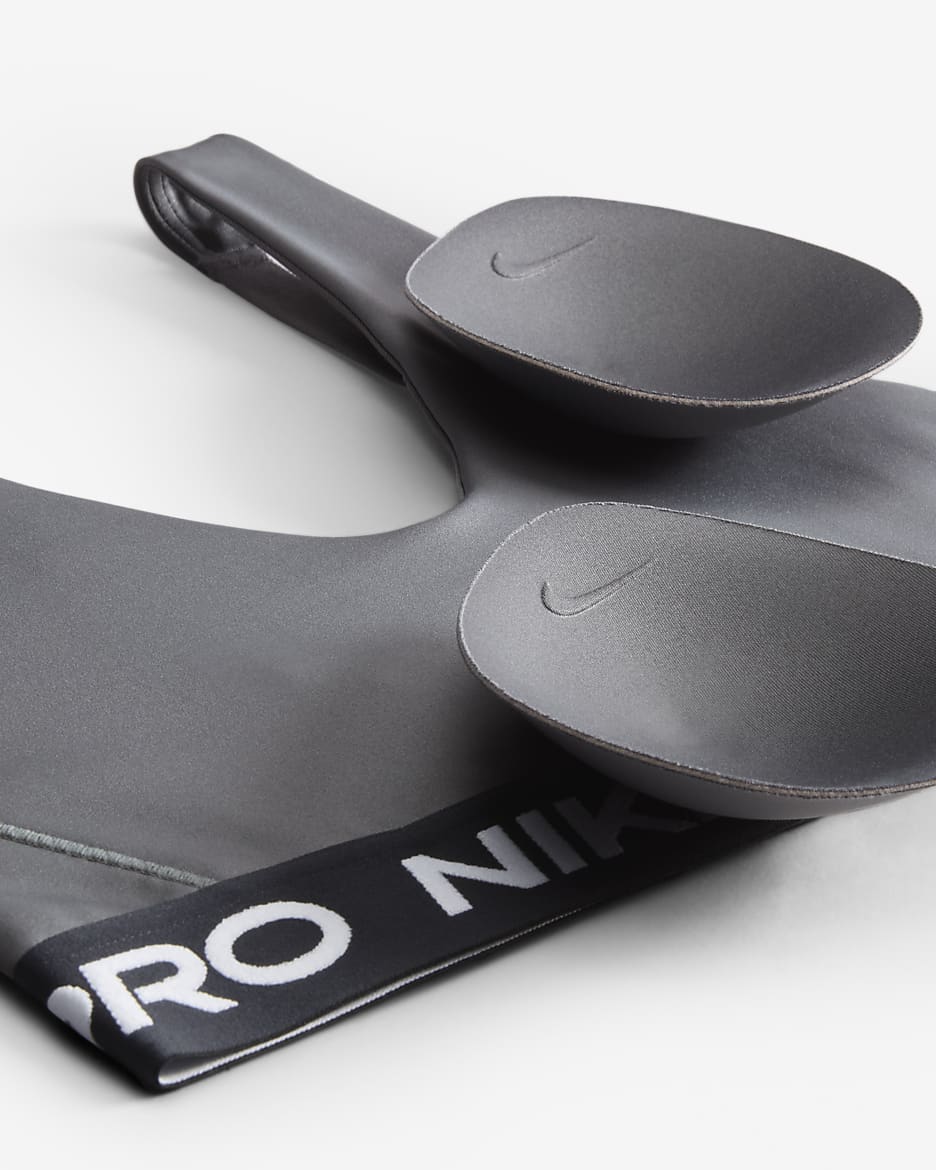 Dámská sportovní podprsenka Nike Pro Indy Plunge s vycpávkami a střední oporou - Iron Grey/Bílá