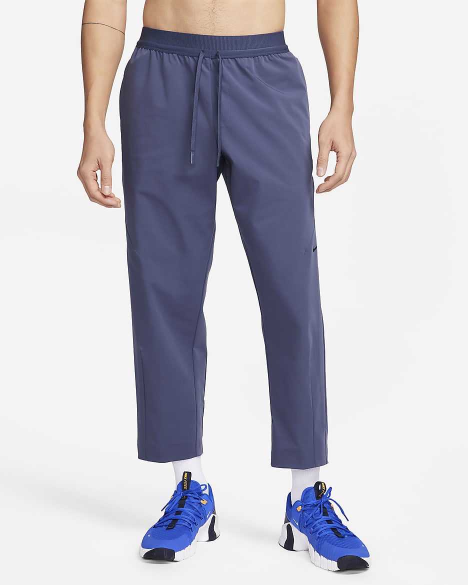 Nike A.P.S. Pantaloni versatili in tessuto Dri-FIT – Uomo - Thunder Blue/Nero