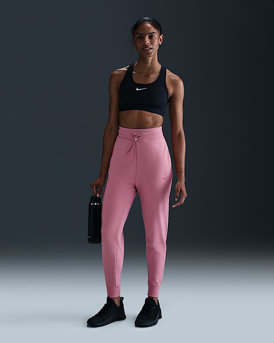 Joggers de French Terry de tiro alto de 7/8 para mujer Nike Dri-FIT One - Rosa elemental/Negro