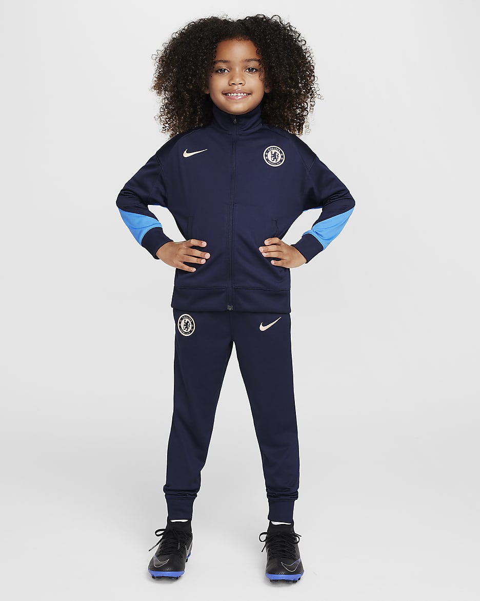 Chelsea F.C. Strike Younger Kids' Nike Dri-FIT Football Knit Tracksuit - Obsidian/Light Photo Blue/Guava Ice