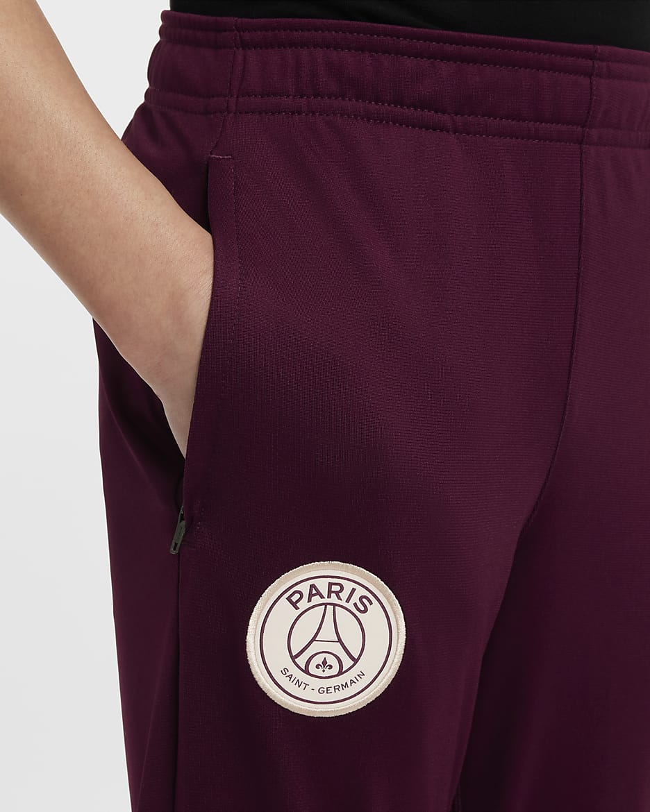 Paris Saint-Germain Strike Nike Dri-FIT strikket fotballtracksuit til store barn - Bordeaux/Geode Teal/Guava Ice