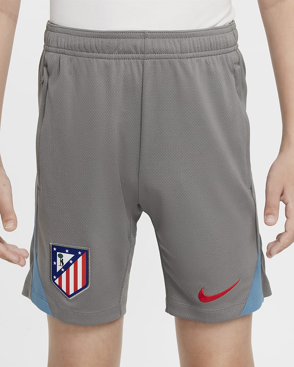 Atlético Madrid Strike Nike Dri-FIT strikket fotballshorts til store barn - Flat Pewter/Noise Aqua/Light Crimson