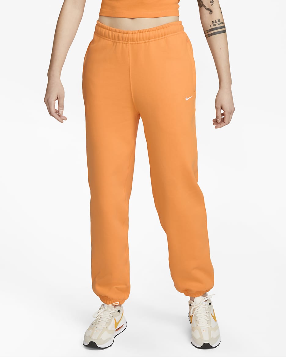 Nike Solo Swoosh Women's Fleece Pants - Vivid Orange/White