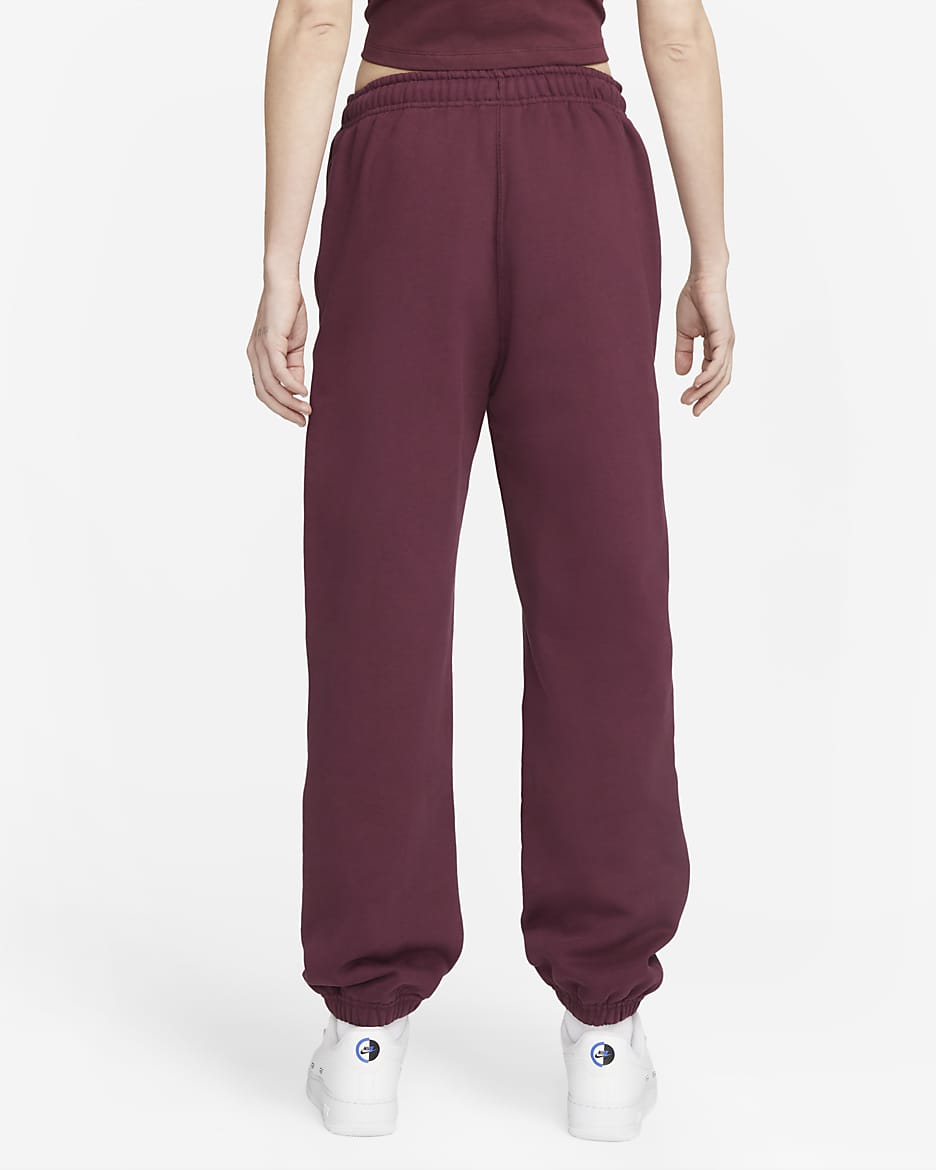 Pantaloni in fleece Nike Solo Swoosh - Donna - Night Maroon