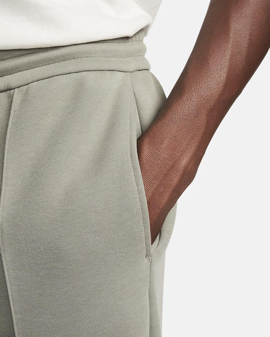 Pantalon de survêtement ample à ourlet ouvert Nike Sportswear Tech Fleece Reimagined pour homme - Dark Stucco