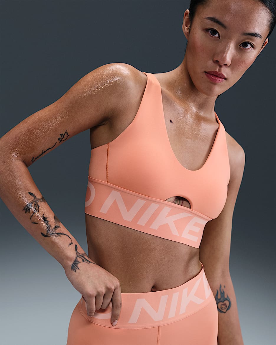 Nike Pro Indy Plunge Women's Medium-Support Padded Sports Bra - Apricot Agate/Washed Coral/White