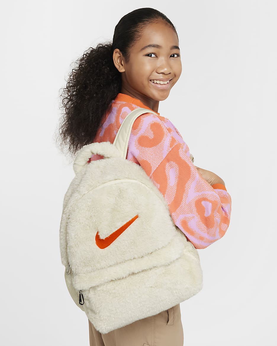 Nike Older Kids' Faux Fur Backpack (11L) - Coconut Milk/Coconut Milk/Safety Orange