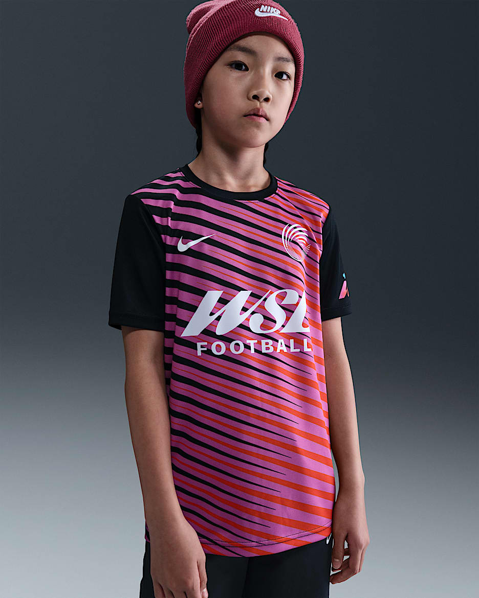 Przedmeczowa koszulka piłkarska dla starszych dzieci Nike WSL - Czerń/Action Grape/Safety Orange