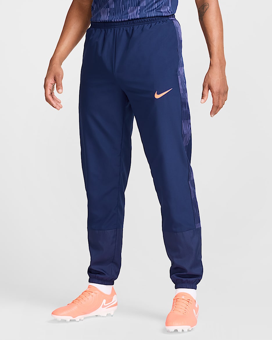 Pants de fútbol Repel para hombre Nike Academy+ - Azul vacío/Naranja pulso