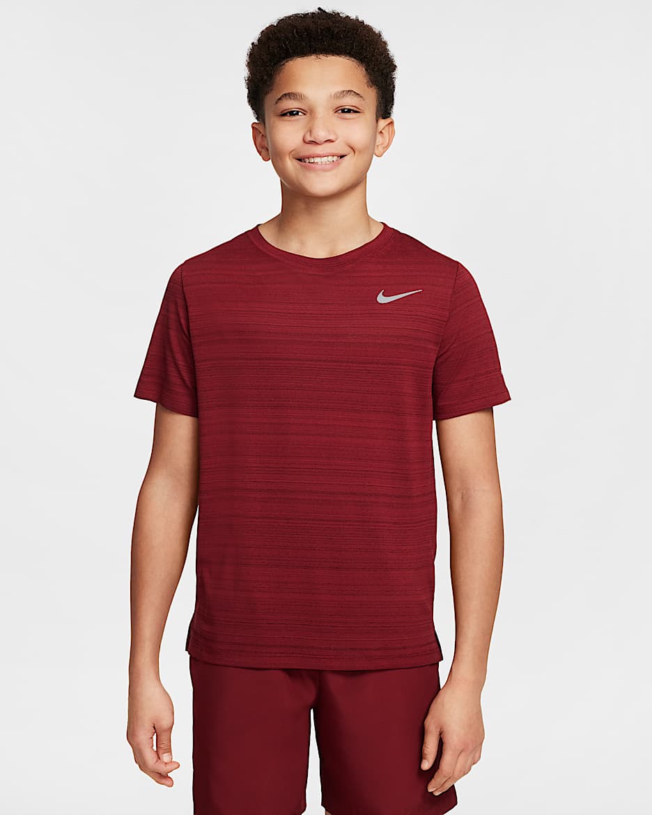 Nike Dri-FIT Miler Playera de entrenamiento para niño talla grande - Rojo team