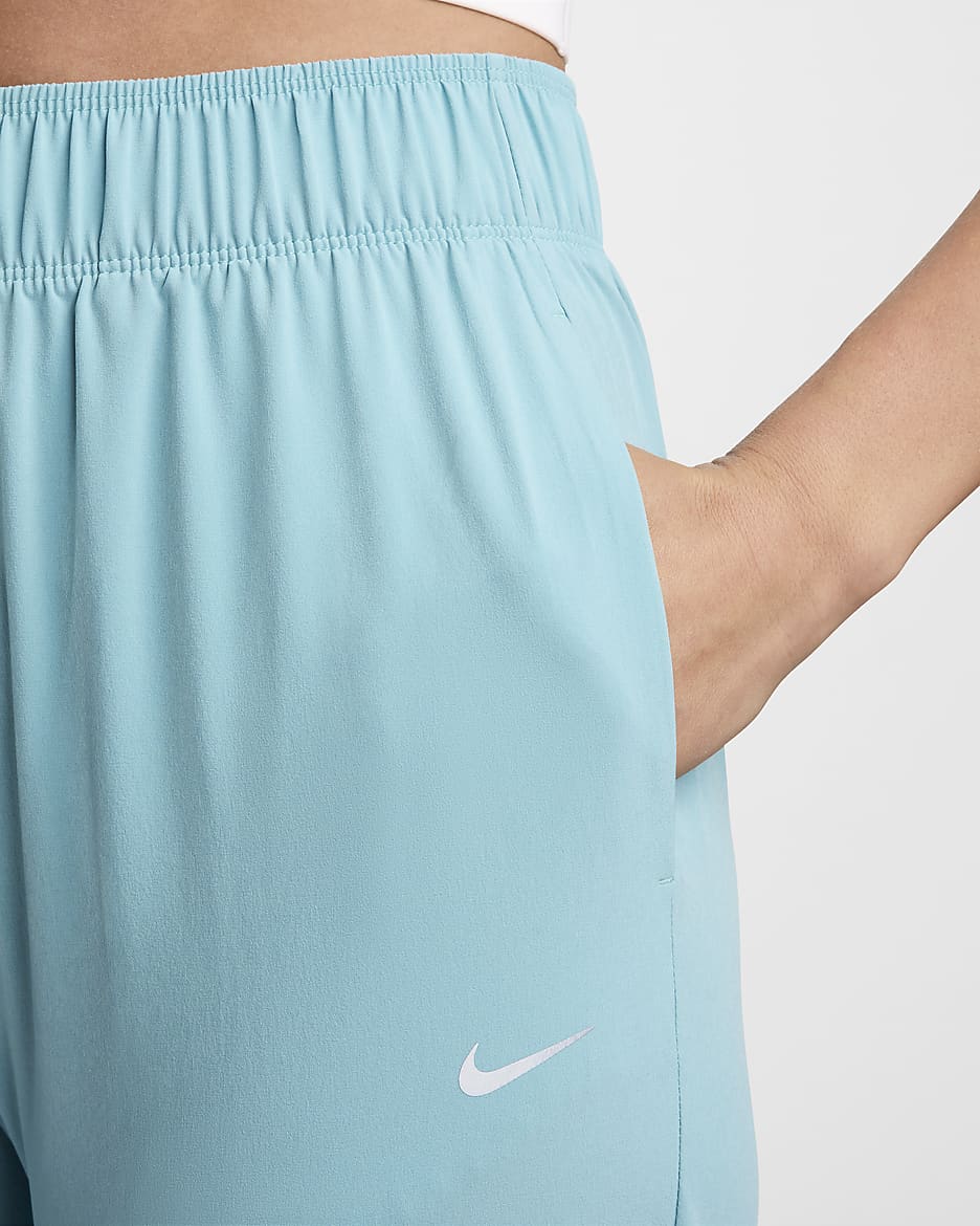 Nike Dri-FIT Fast 7/8-Laufhose mit mittelhohem Bund für Damen - Denim Turquoise