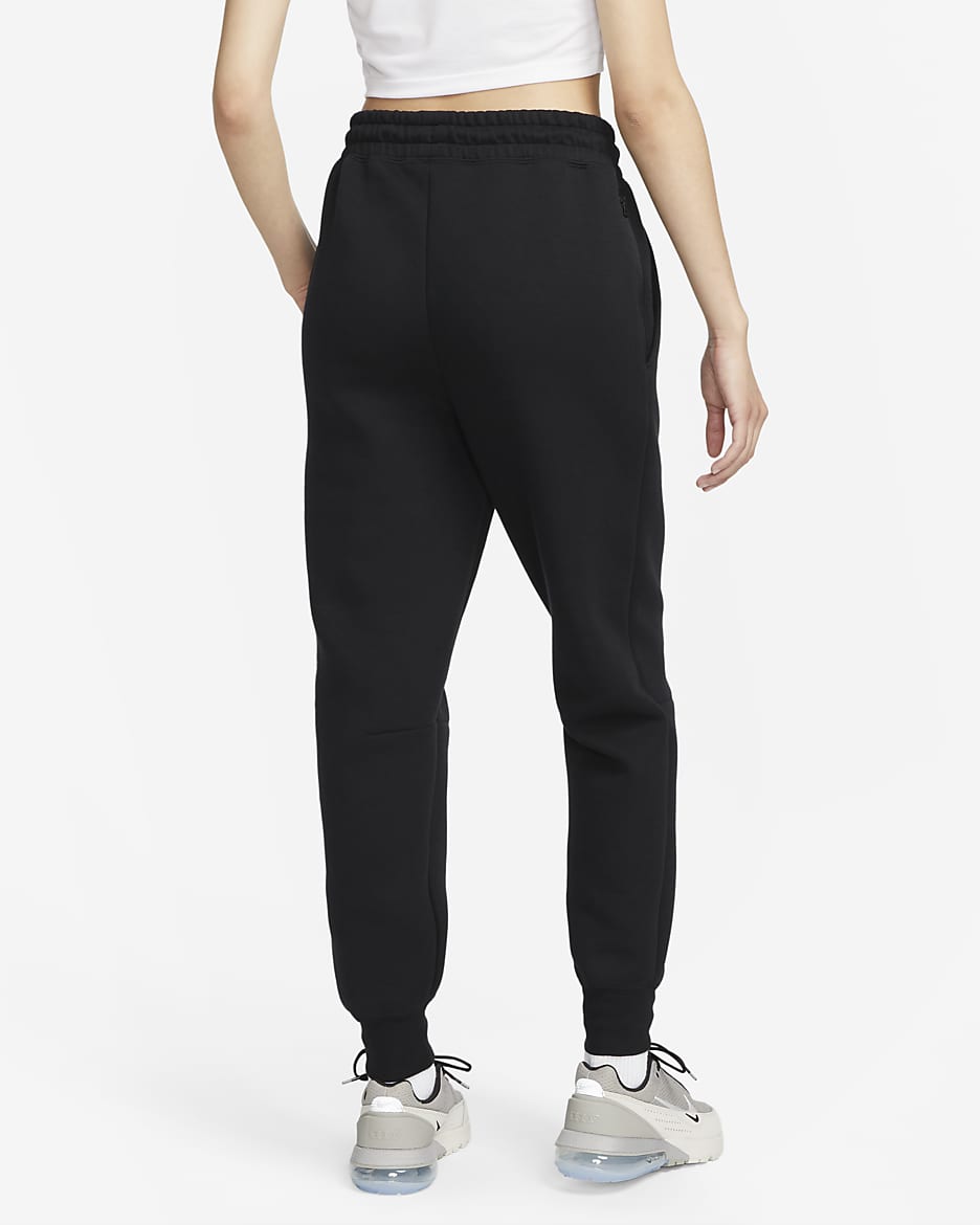 Pantaloni jogger a vita media Nike Sportswear Tech Fleece – Donna - Nero/Nero