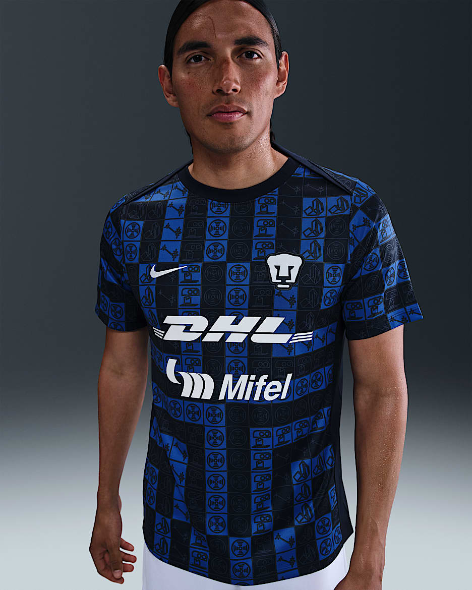 Playera de manga corta de fútbol Nike Dri-FIT para antes del partido para hombre Pumas UNAM Academy Pro - Obsidiana/Blanco