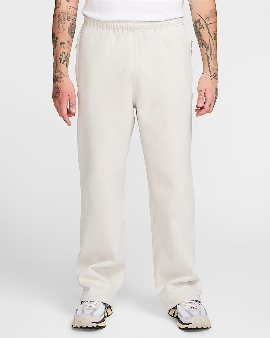 Pants de tejido Fleece con dobladillo abierto para hombre Nike Solo Swoosh - Hueso claro/Blanco