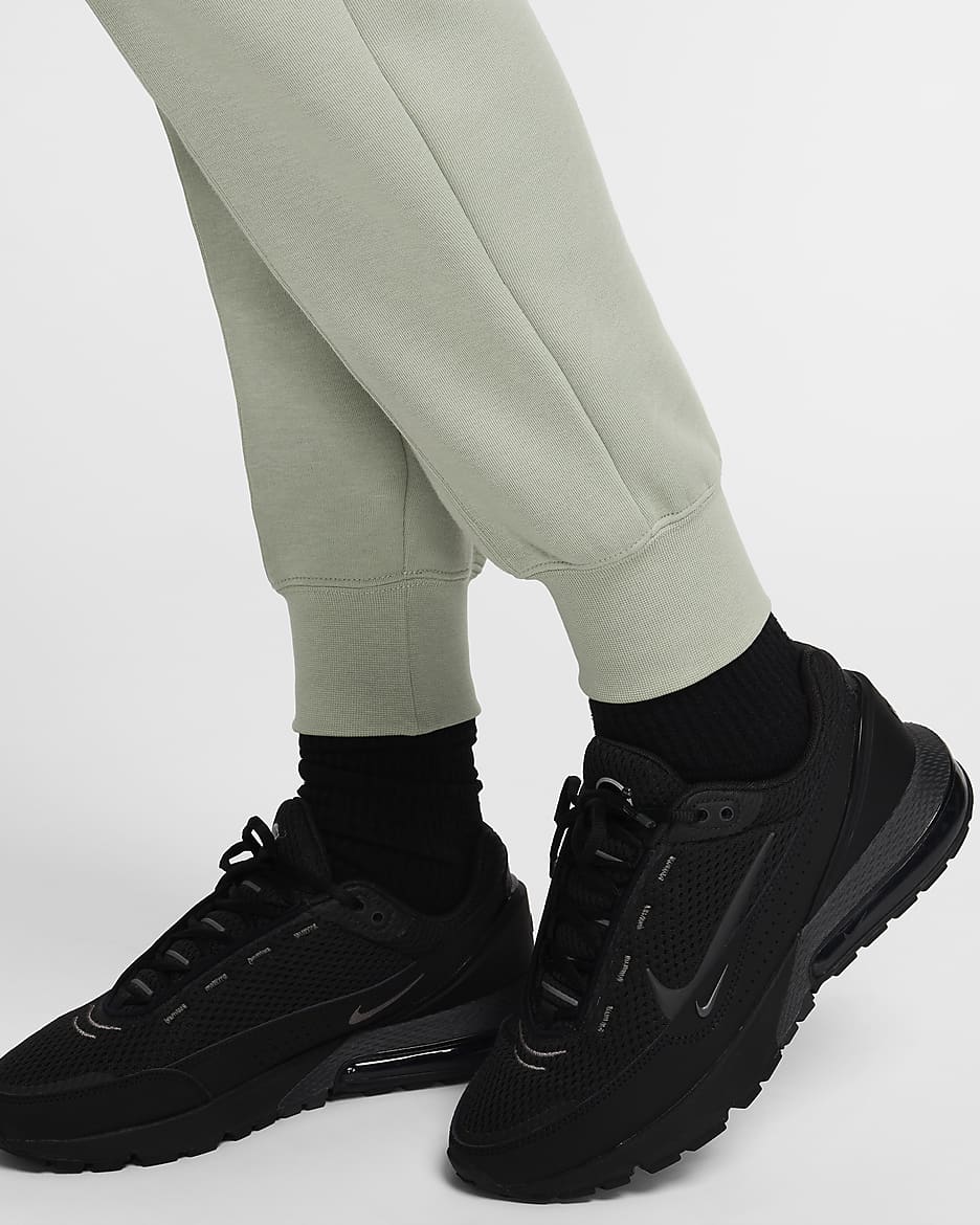 Nike Sportswear Tech Fleece joggebukse med mellomhøyt liv til dame - Jade Horizon/Svart