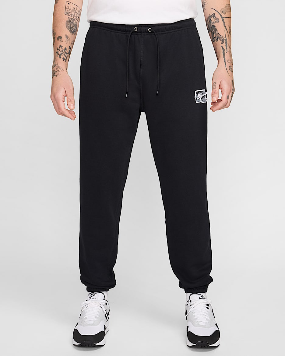 Pants de French Terry con puño para hombre Nike Club - Negro/Blanco
