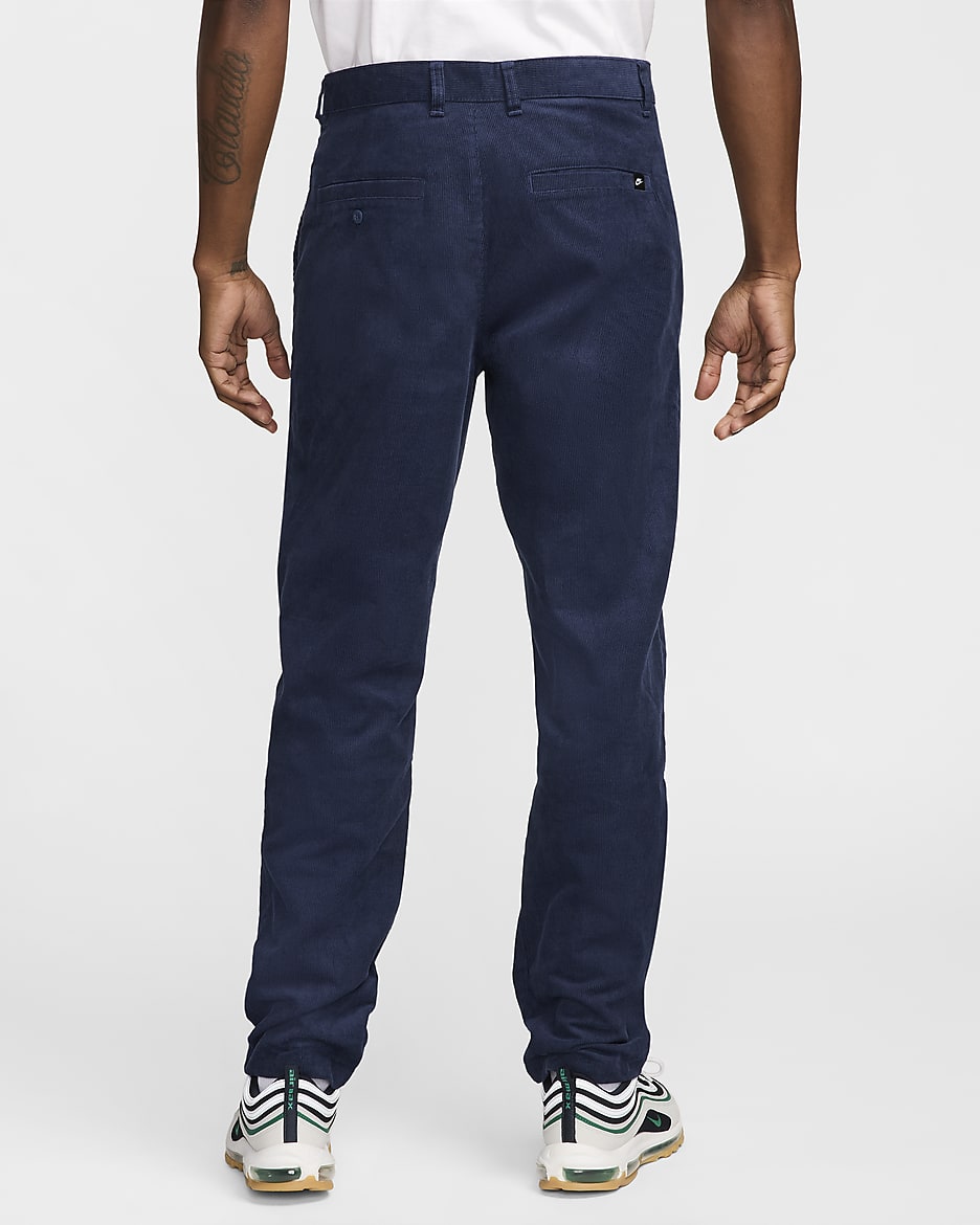 Pánské manšestrové chino kalhoty Nike Club - Midnight Navy