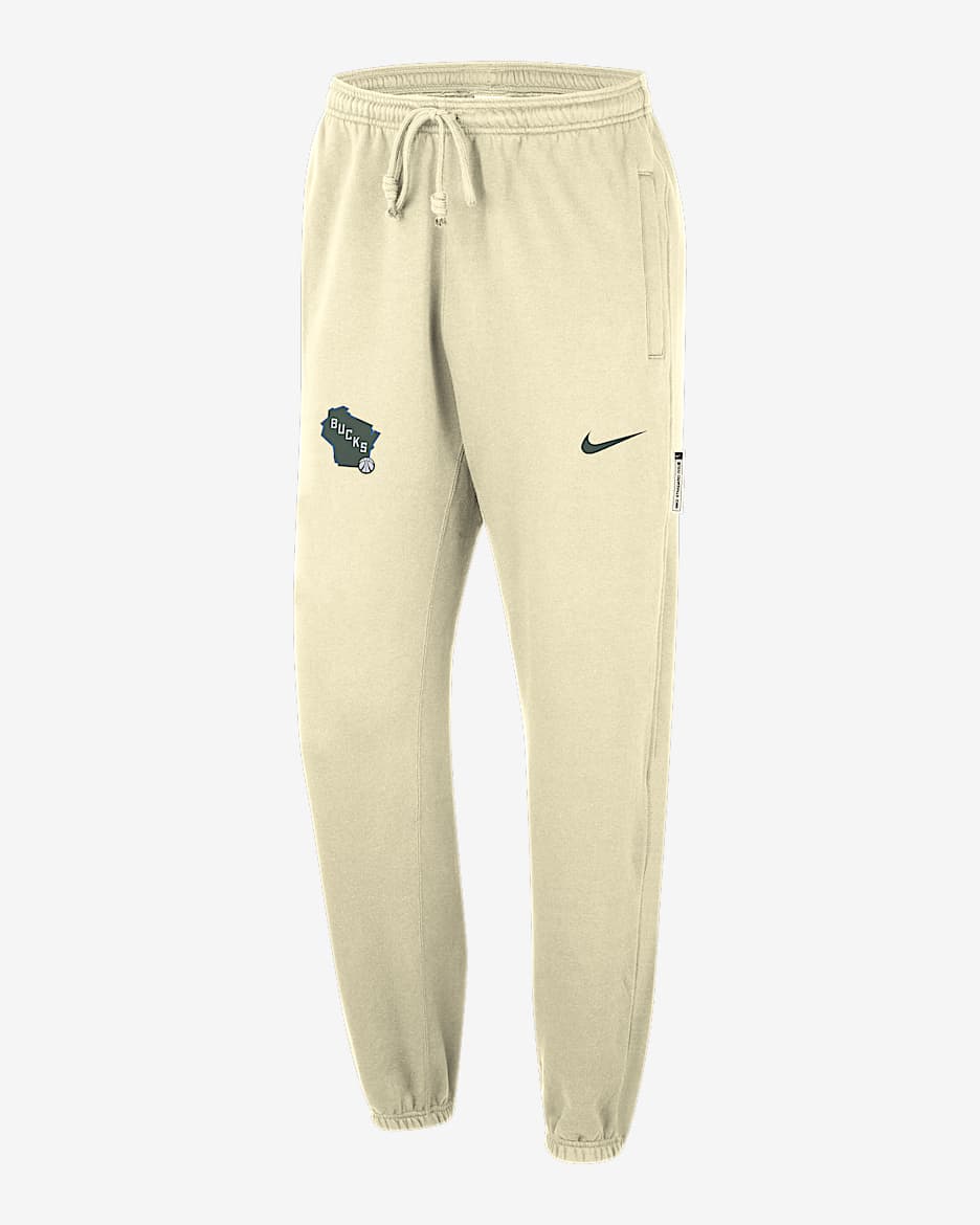 Pants Nike Dri-FIT de la NBA para hombre Milwaukee Bucks Standard Issue City Edition - Ópalo liso/Abeto