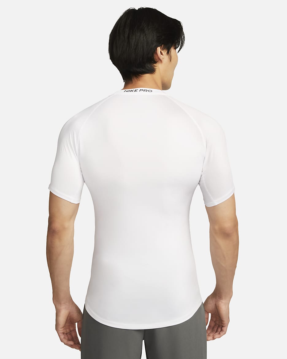 Tætsiddende Nike Pro Dri-FIT-fitnessoverdel med korte ærmer til mænd - hvid/sort