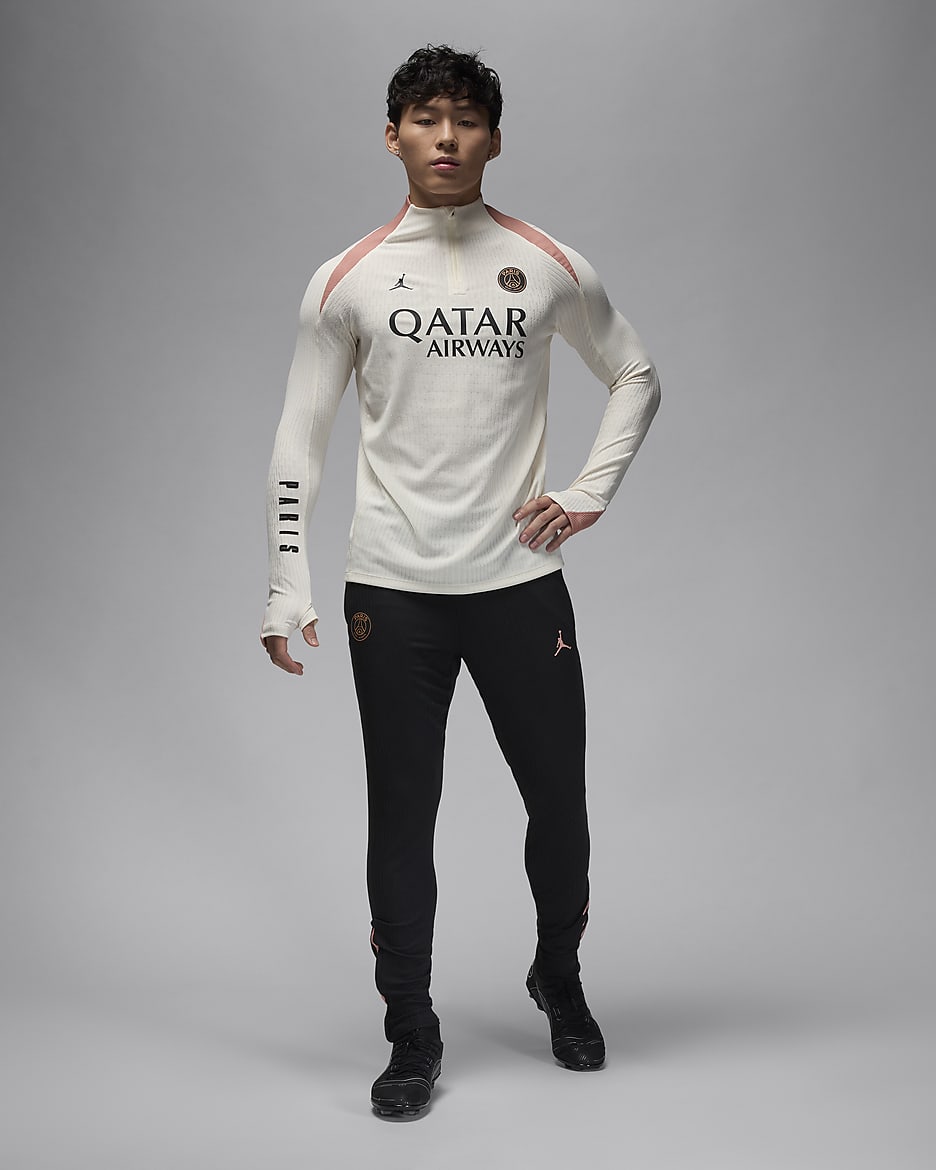 Męska treningowa koszulka piłkarska z dzianiny Jordan Dri-FIT ADV Paris Saint-Germain Strike Elite (wersja trzecia) - Pale Ivory/Rust Pink/Czerń