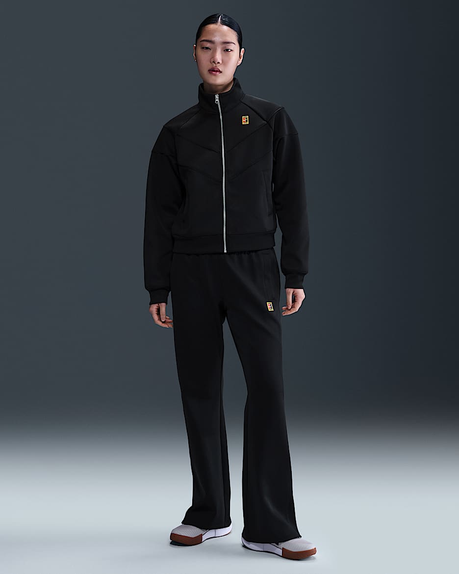 Pants de tenis de tiro medio para mujer NikeCourt Heritage Windrunner - Negro