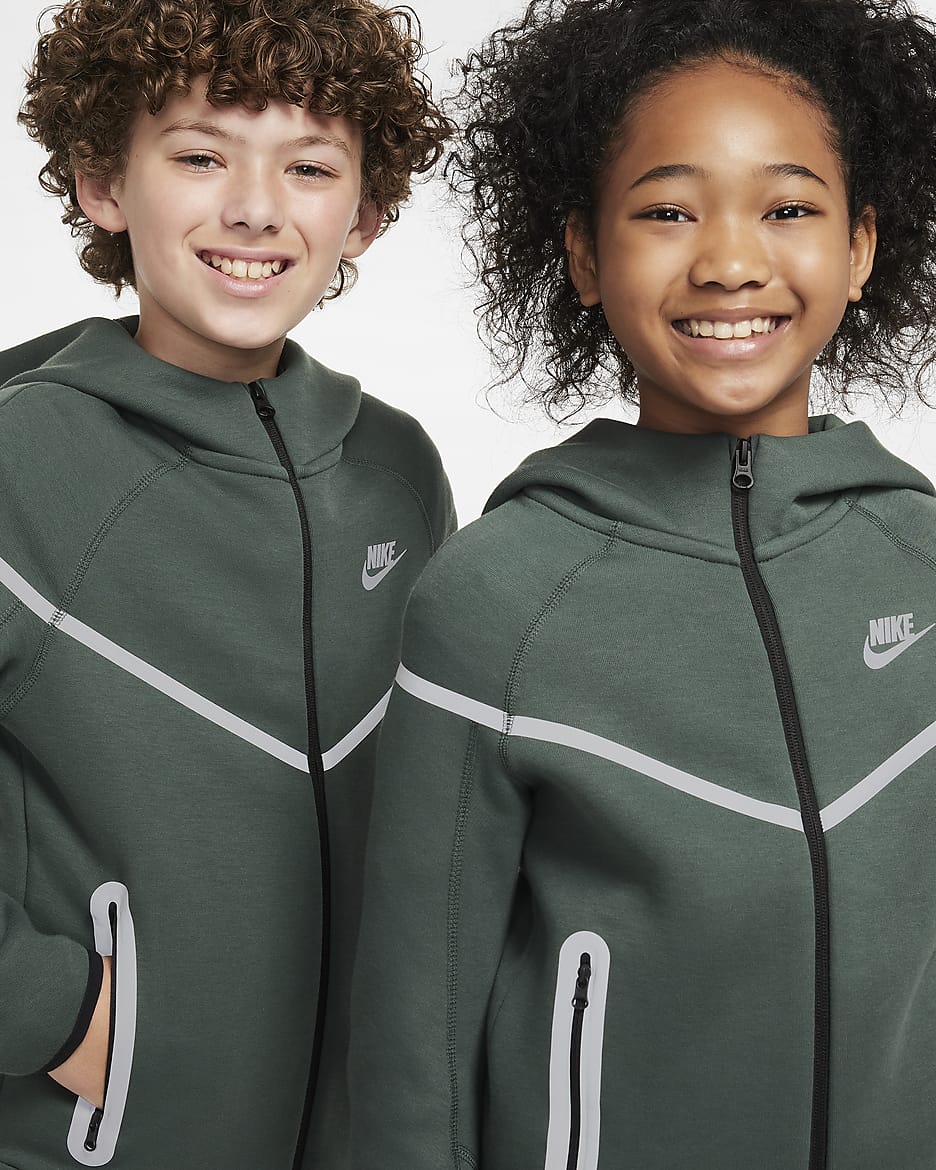 Felpa con cappuccio e zip a tutta lunghezza dal design rifrangente Nike Sportswear Tech Fleece – Ragazzo/a - Vintage Green