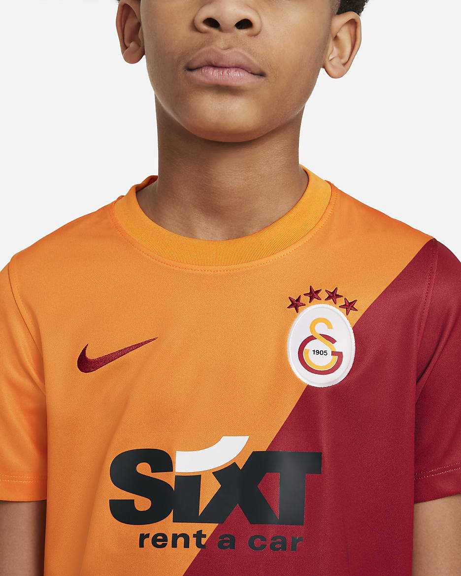 Galatasaray Home Kurzarm-Fußballoberteil für ältere Kinder - Vivid Orange/Pepper Red/Pepper Red