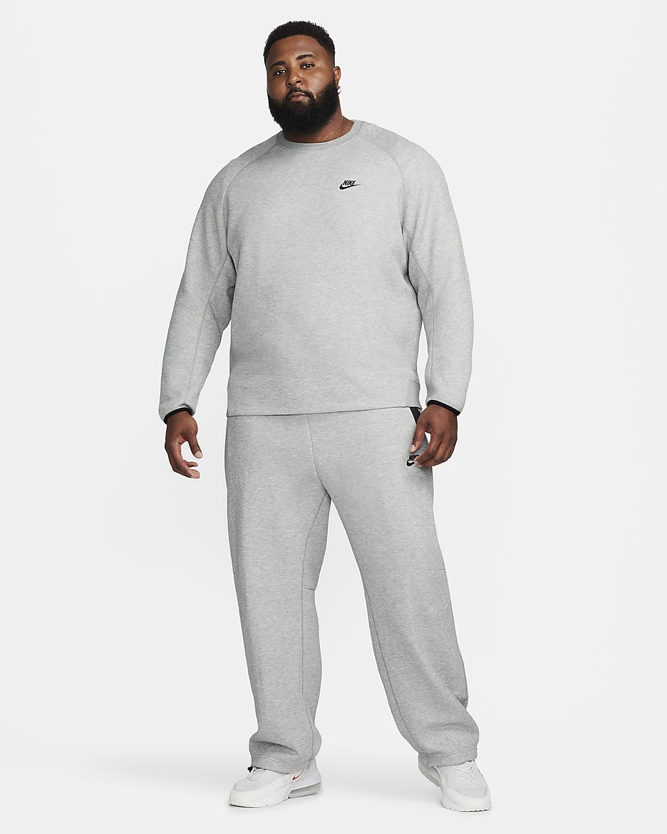 Sweatpants Nike Sportswear Tech Fleece med vida fållar för män - Dark Grey Heather/Svart