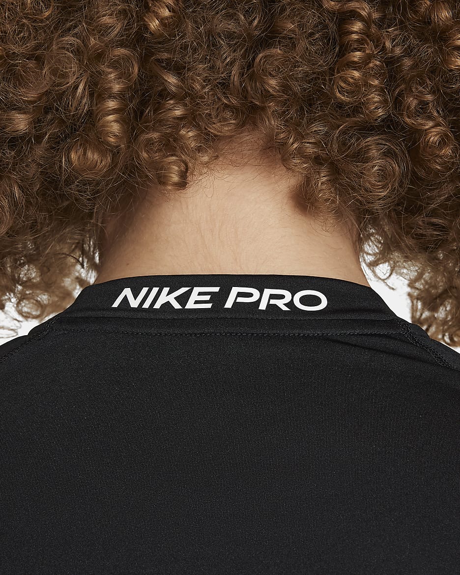Langærmet Nike Pro Dri-FIT-overdel til større børn (drenge) - sort/hvid