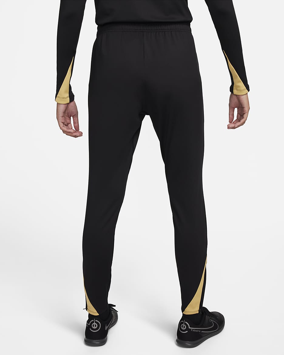 Nike Strike Pantalón de fútbol Dri-FIT - Mujer - Negro/Jersey Gold/Oro metalizado