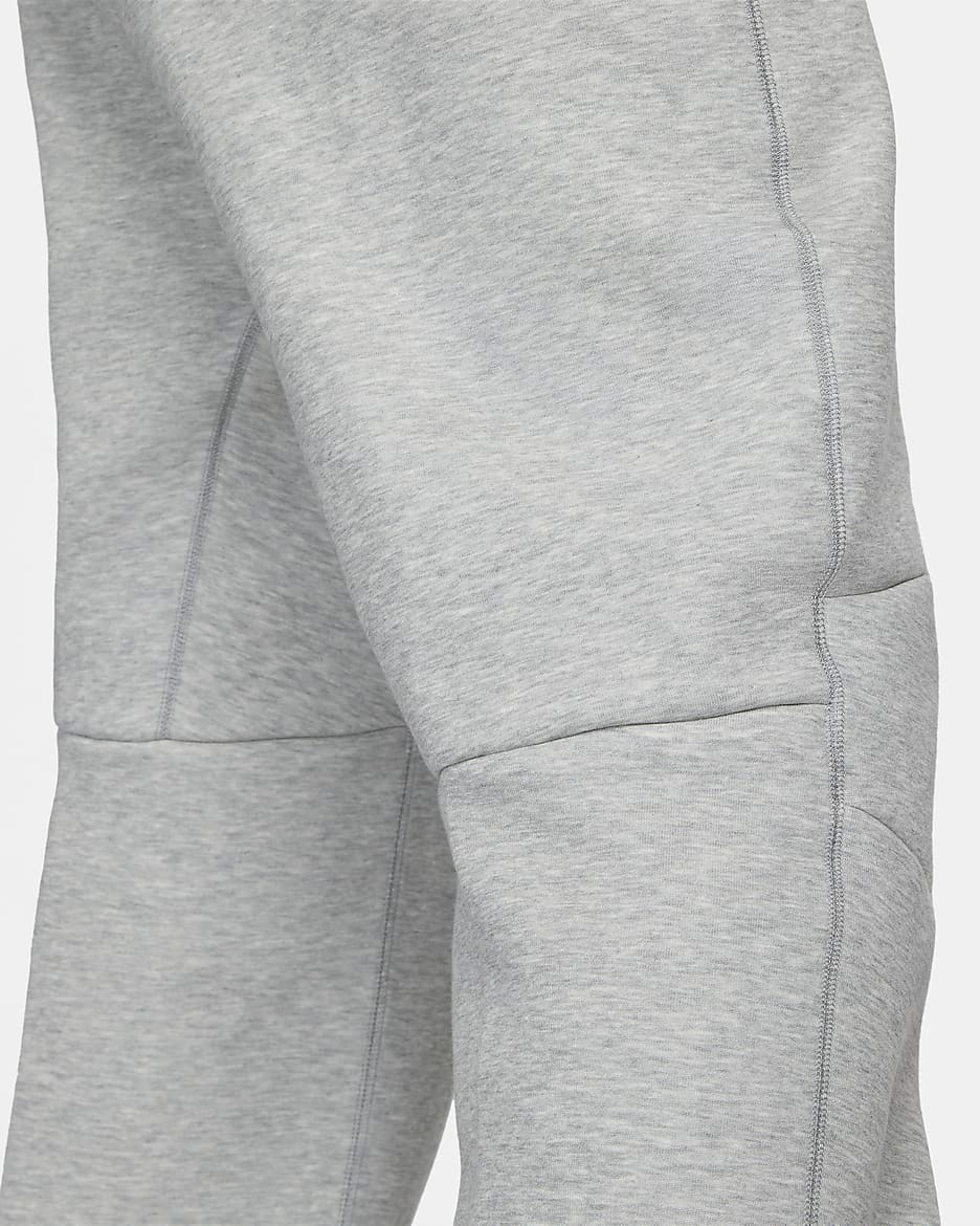 Pantalon de survêtement à ourlet ouvert Nike Sportswear Tech Fleece pour homme - Dark Grey Heather/Noir