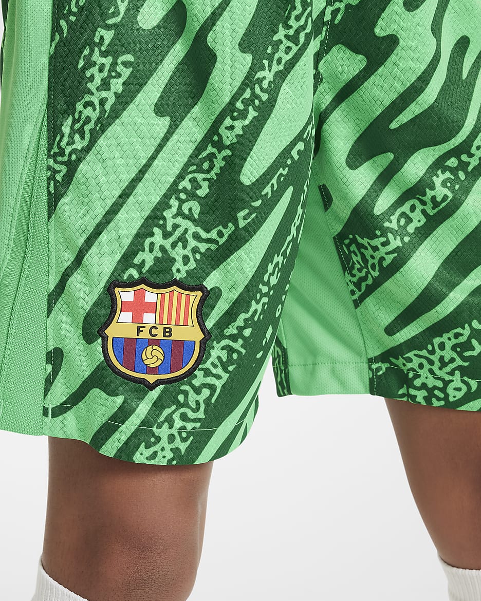 Spodenki piłkarskie dla dużych dzieci Nike Dri-FIT FC Barcelona Stadium Goalkeeper 2024/25 – replika - Green Spark/Pine Green/Biel