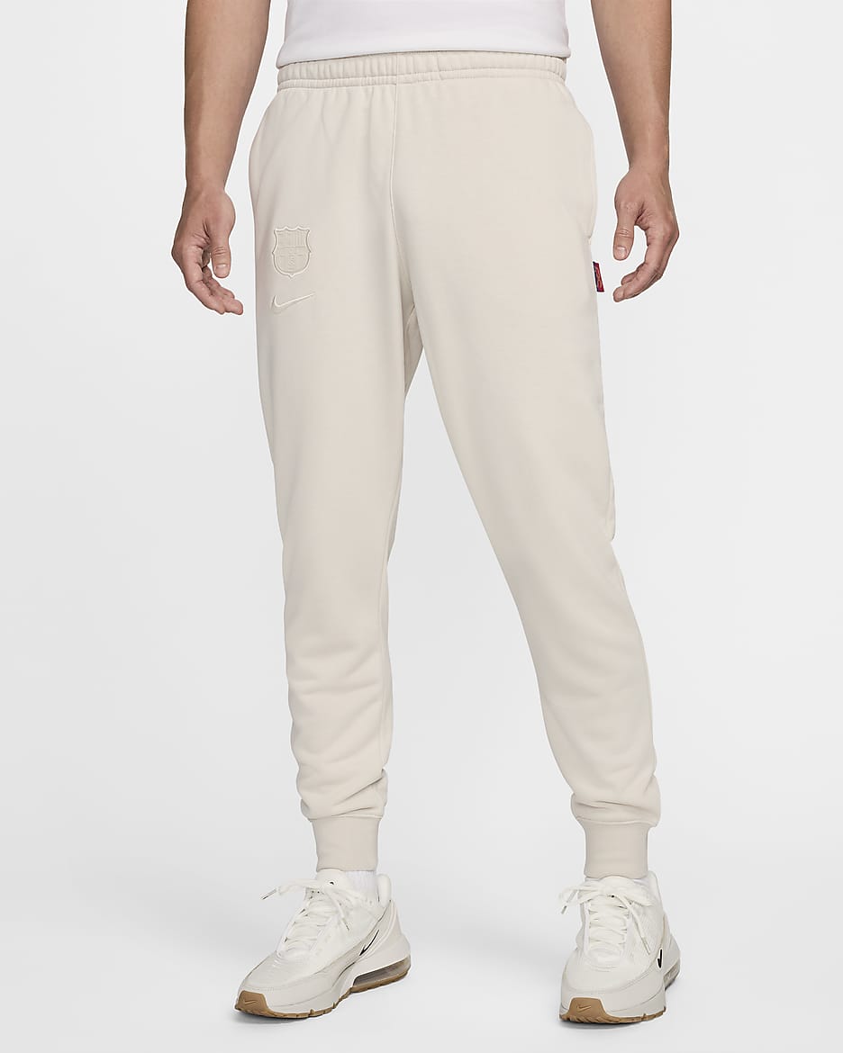 FC Barcelona Club local Joggers de fútbol Nike de French Terry para hombre - Marrón verdoso claro/Marrón verdoso claro