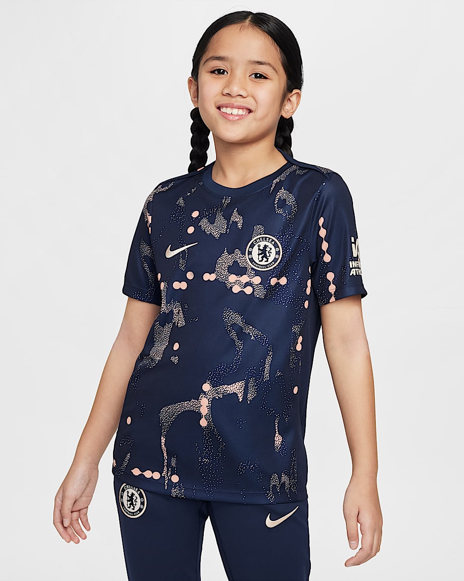 Chelsea F.C. Academy Pro SE Older Kids' Nike Dri-FIT Football Pre-Match Short-Sleeve Top - Obsidian/Apricot Agate/Guava Ice
