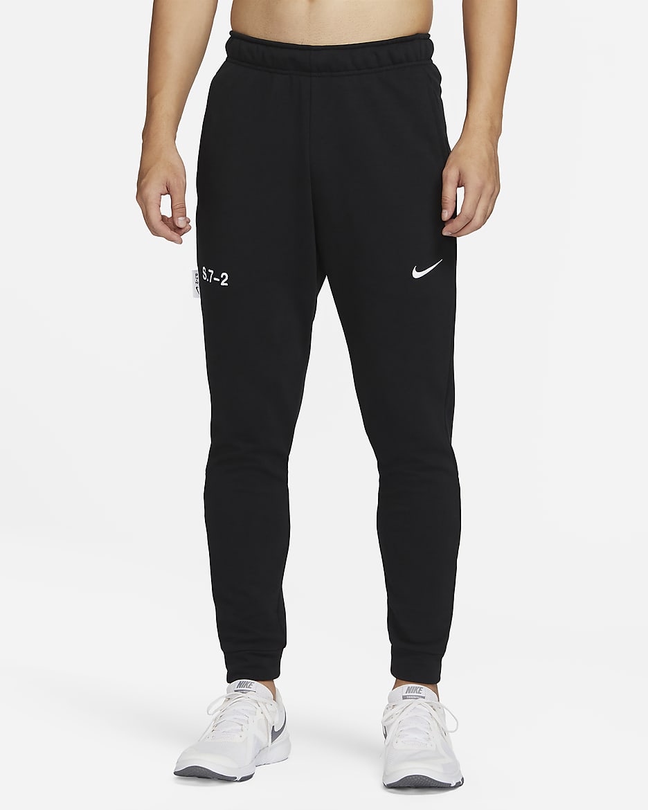 กางเกงฟิตเนสขายาวทรงขาเรียวผู้ชาย Nike Dri-FIT Studio '72 - ดำ/ขาว