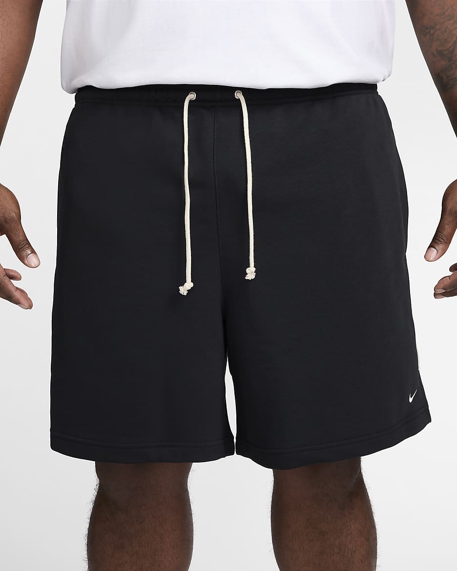 Shorts de básquetbol de tejido Fleece Dri-FIT de 20 cm para hombre Nike Standard Issue - Negro/Marfil pálido