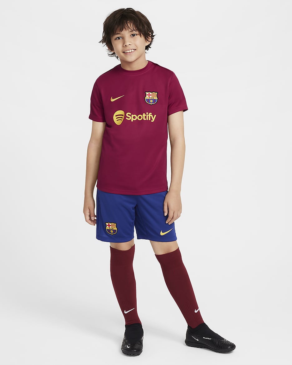 FC Barcelona Academy Pro Nike Dri-FIT voetbaltop met korte mouwen voor kids - Noble Red/Varsity Maize