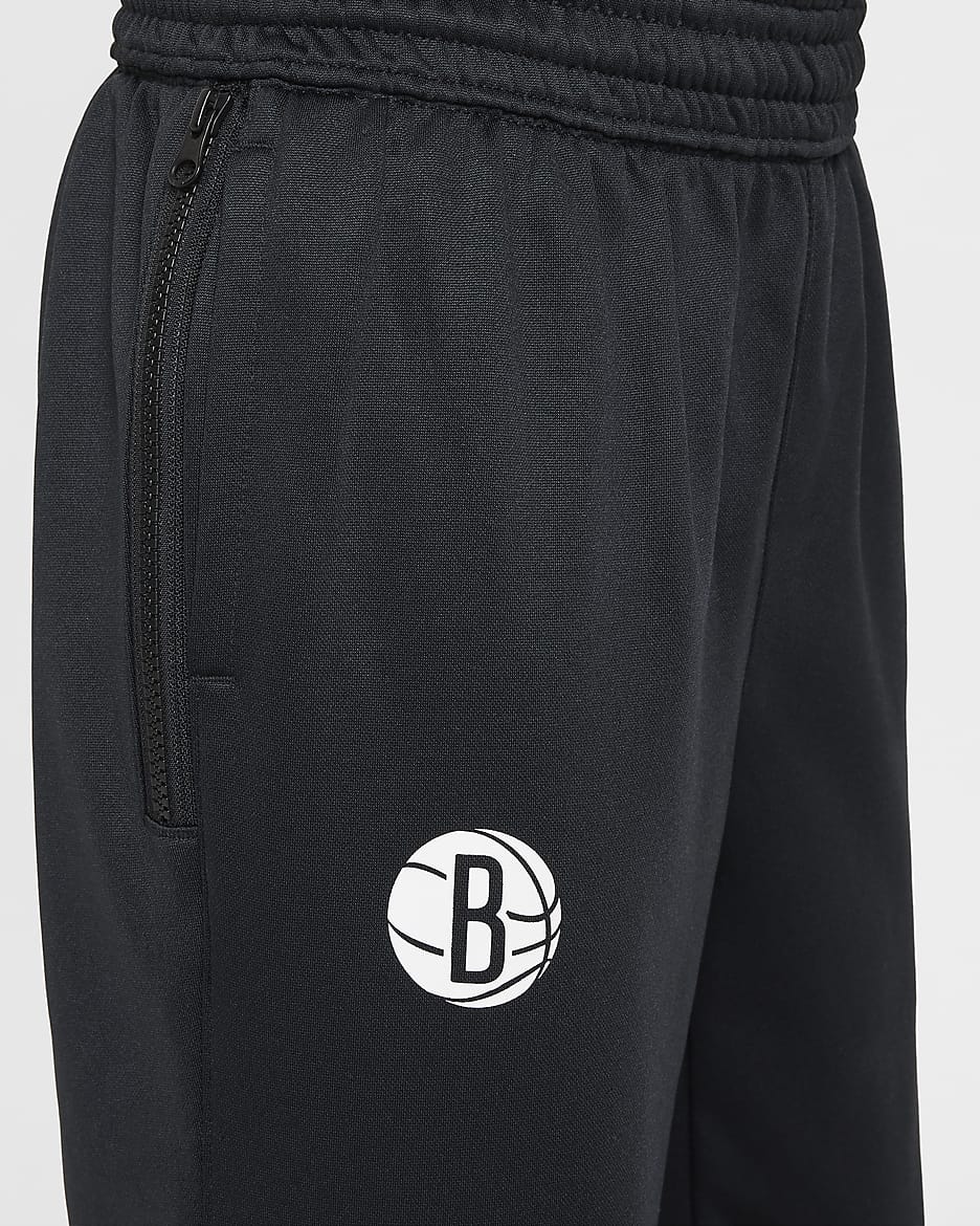 Pantalon Nike Dri-FIT NBA Brooklyn Nets Spotlight pour ado - Noir