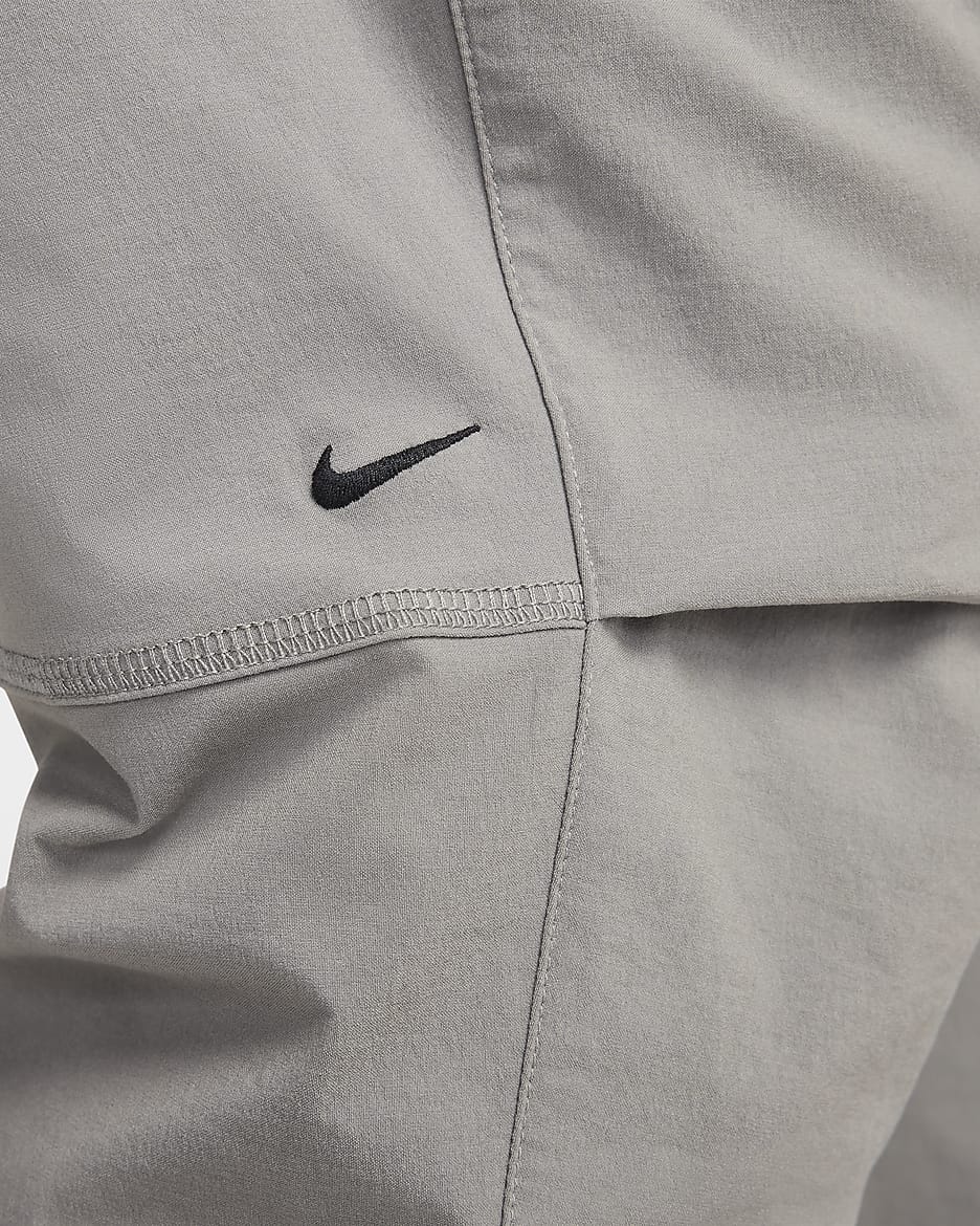 Pantaloni in tessuto Nike Tech – Uomo - Flat Pewter/Nero