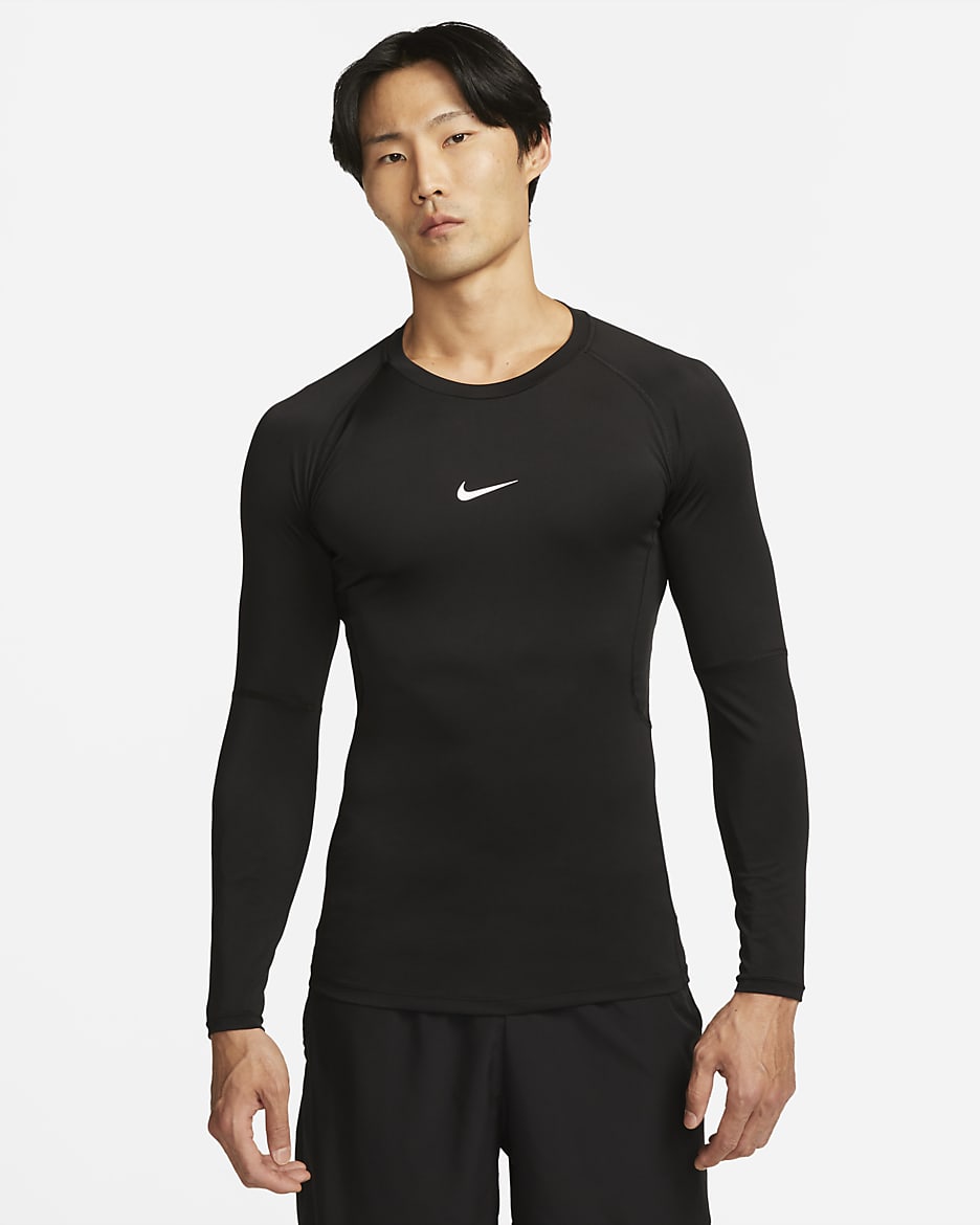 Tætsiddende Nike Pro Dri-FIT-fitnessoverdel med lange ærmer til mænd - sort/hvid