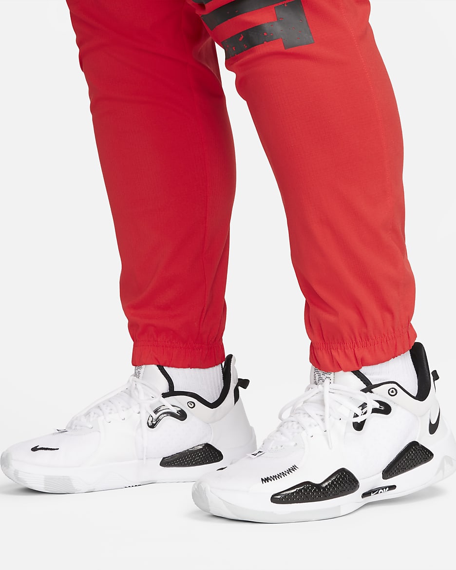 Pants de básquetbol de tejido Woven para hombre Nike DNA - Rojo universitario/Negro