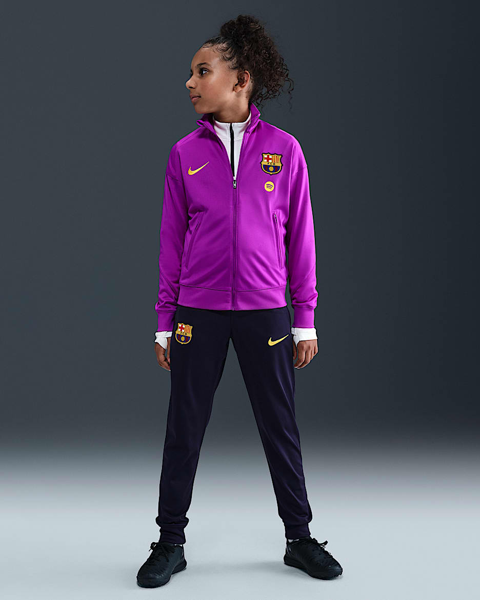Dzianinowy dres piłkarski dla dużych dzieci Nike Dri-FIT FC Barcelona Strike - Vivid Purple/Imperial Purple/Midwest Gold