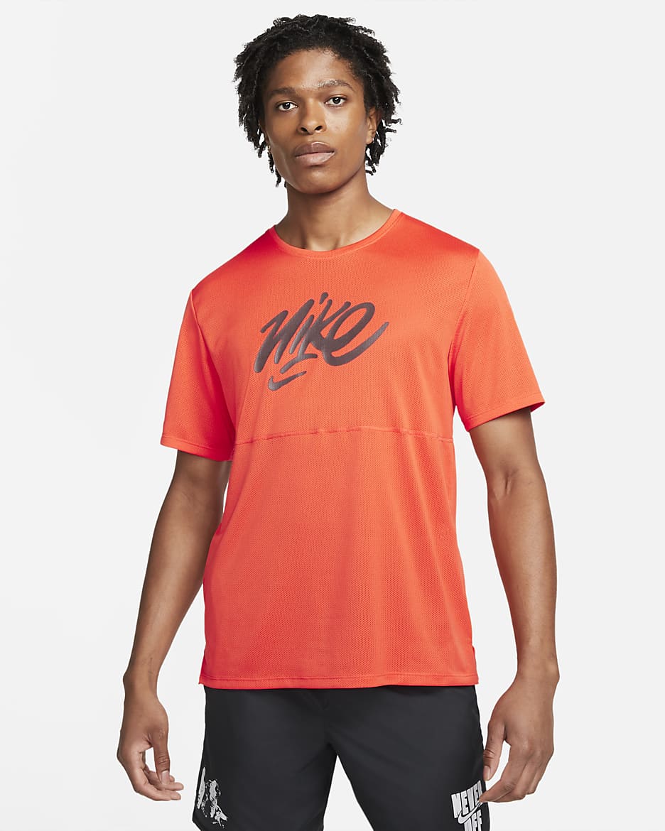 Playera de running de manga corta para hombre Nike Dri-FIT Wild Run - Naranja/Naranja/Café basalto