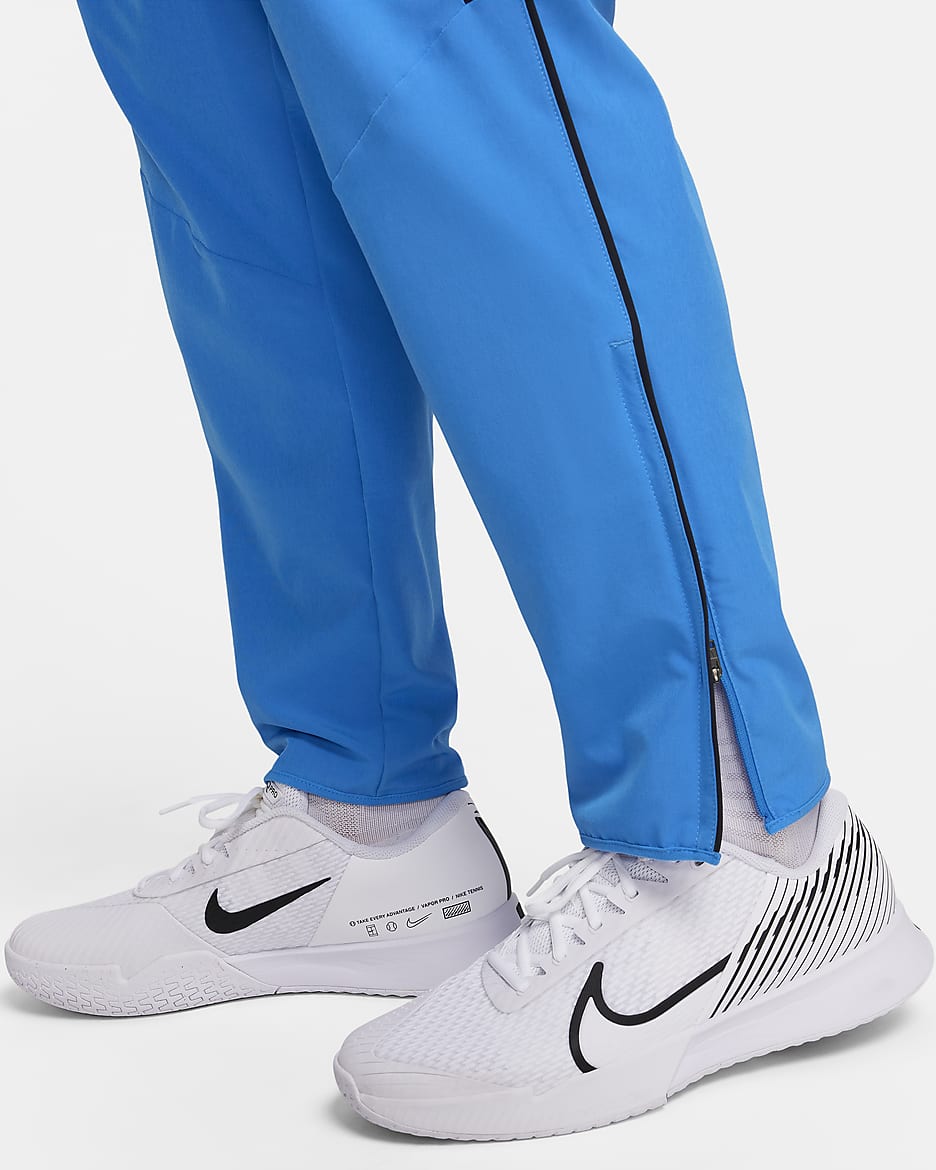 Pantalon de tennis Dri-FIT NikeCourt Advantage pour homme - Light Photo Blue/Noir/Blanc