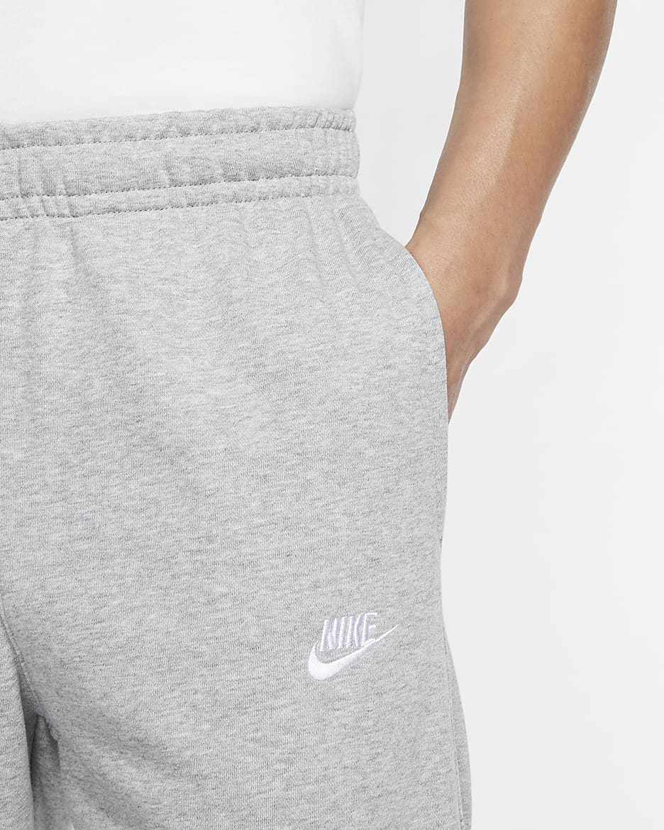 Calças em tecido moletão Nike Sportswear Club para homem - Cinzento Heather escuro/Prateado Matte/Branco